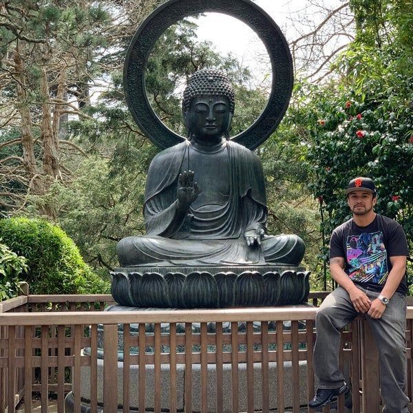 meditating buddha garden statue
