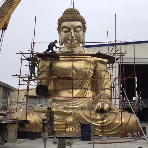 grande statua di buddha in bronzo