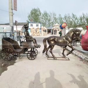 statue de cheval et de calèche