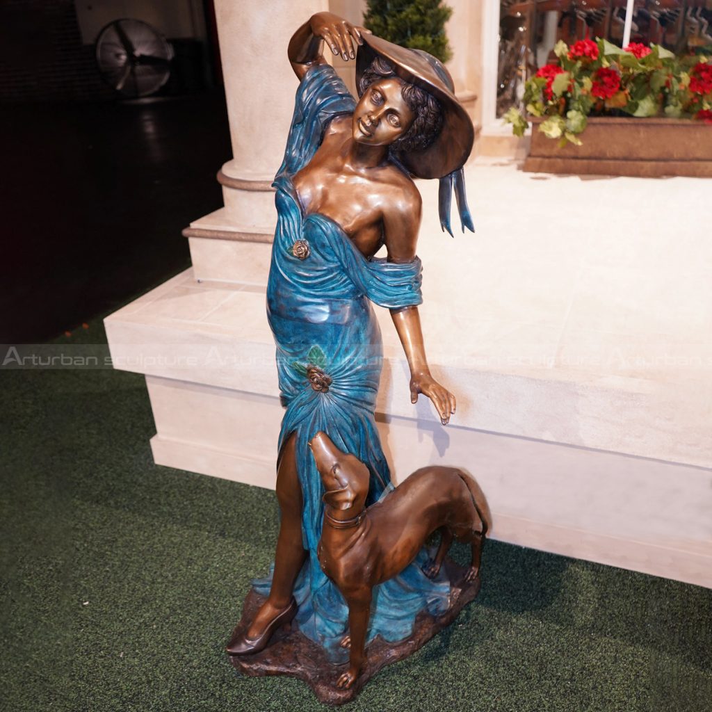 escultura de mulher e cachorro