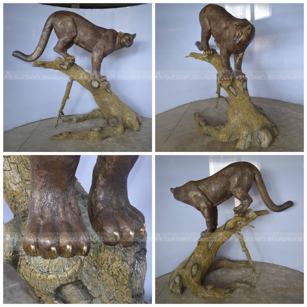 escultura de puma em bronze