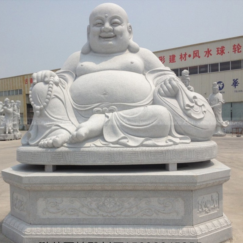 statue de bouddha rieur blanc