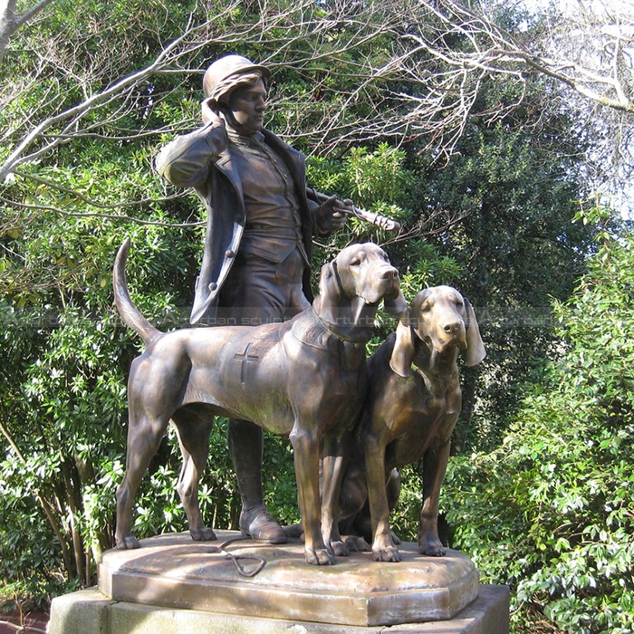 estatua de cazador y perros