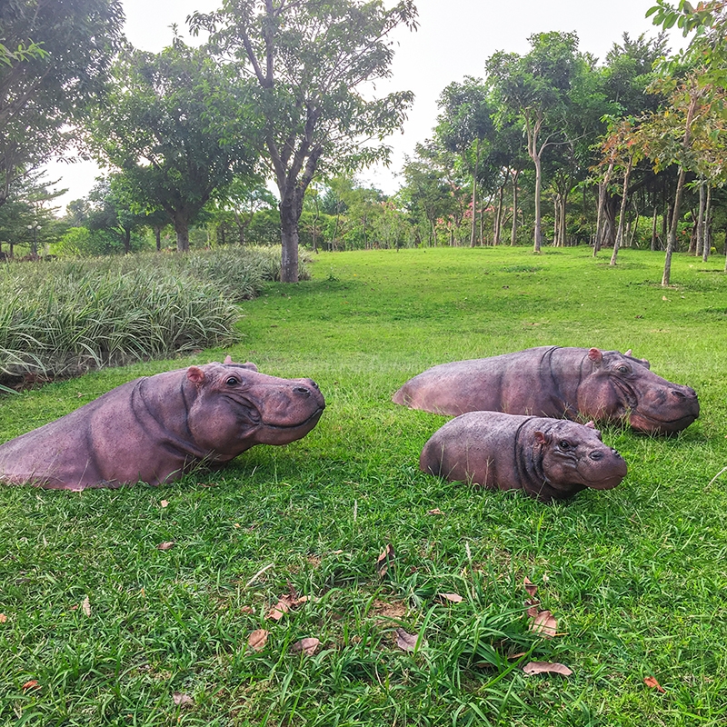 Scultura da giardino di ippopotamo nuotante