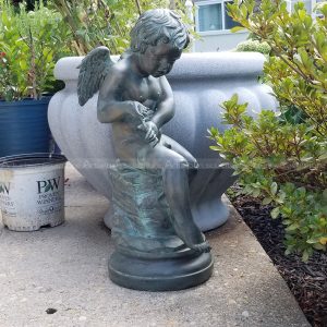 sculture di cherubini da giardino