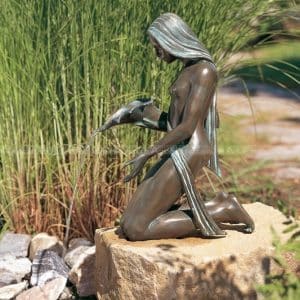 estátua de mulher fonte de água