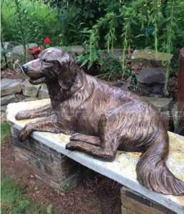 enfeite de jardim de golden retriever