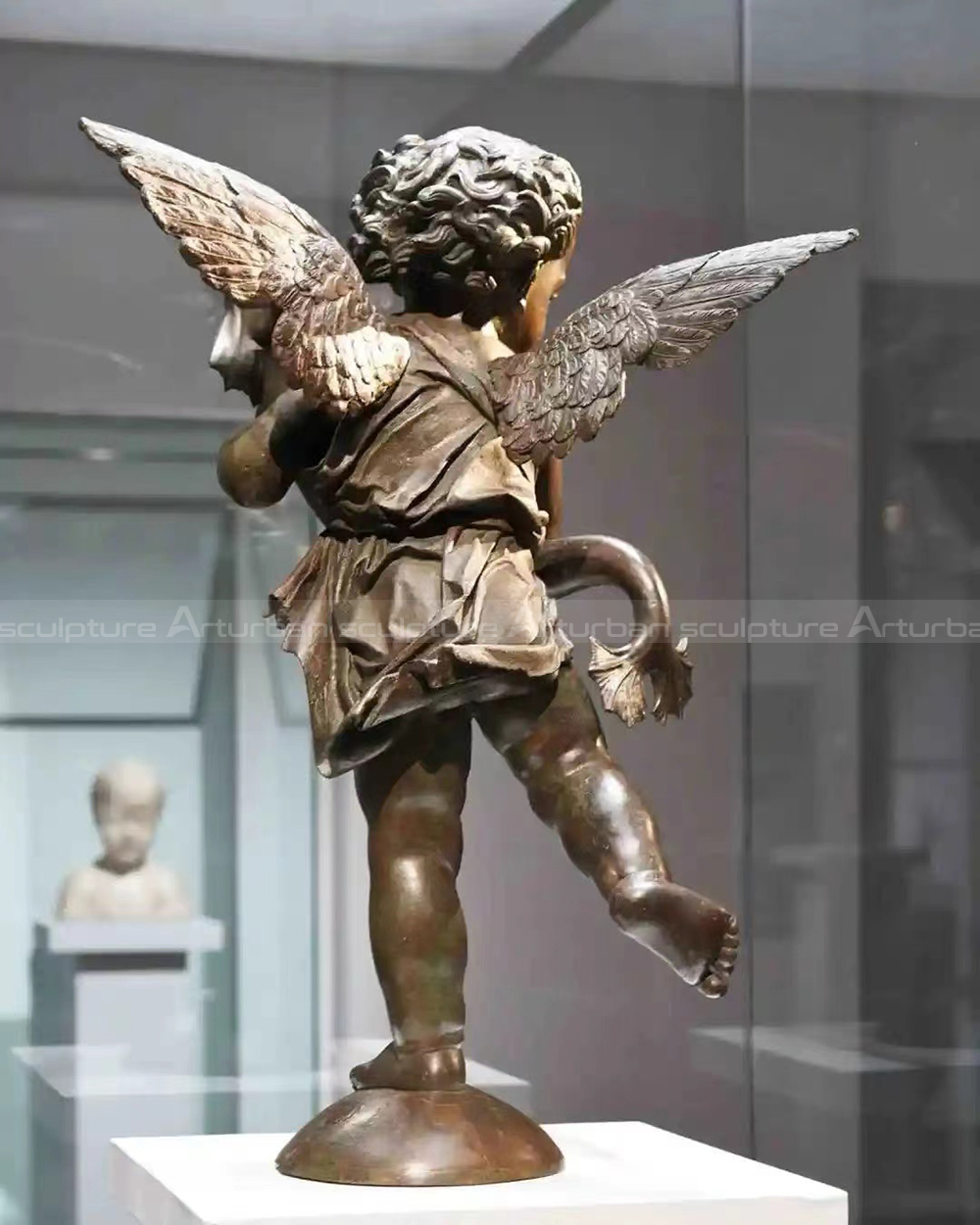 antique cherub statue