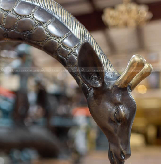 large brass giraffe statue