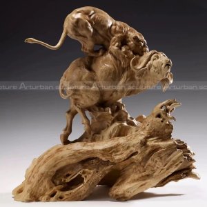 statue de tigre attaquant un mouton