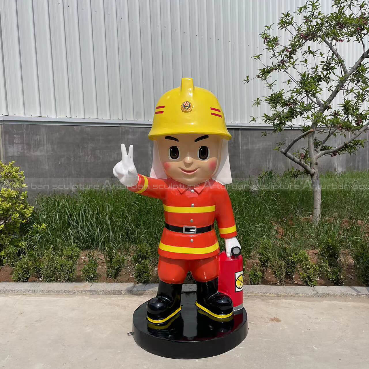 cartoon fireman statue