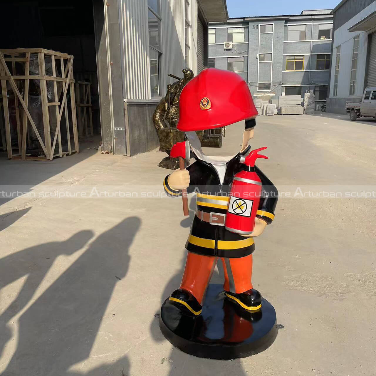 cartoon fireman statue