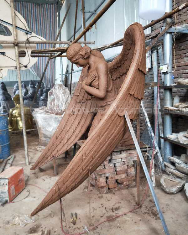 estátua de anjo em cemitério