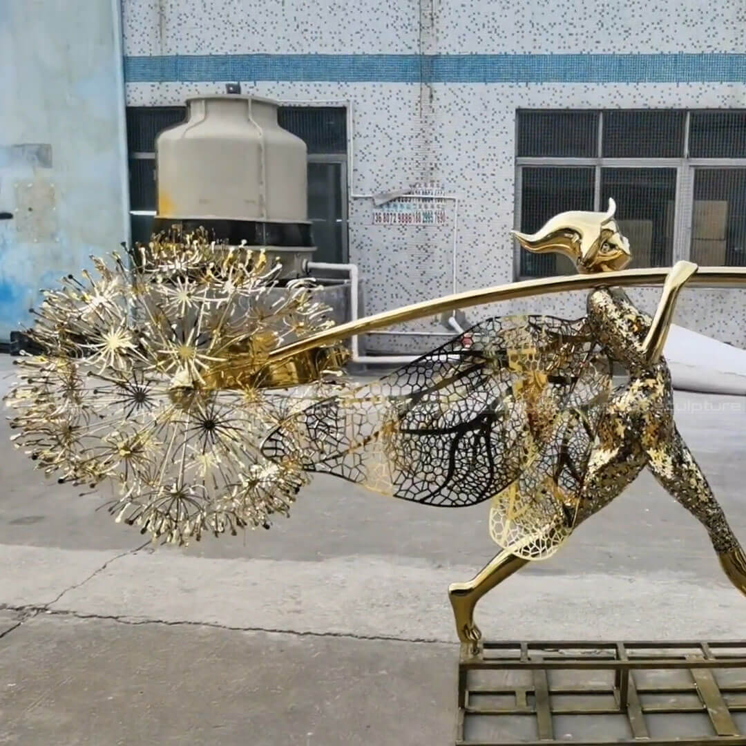escultura de hada y diente de león para jardín