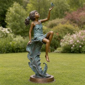 Bronze girl with butterfly statue rear view