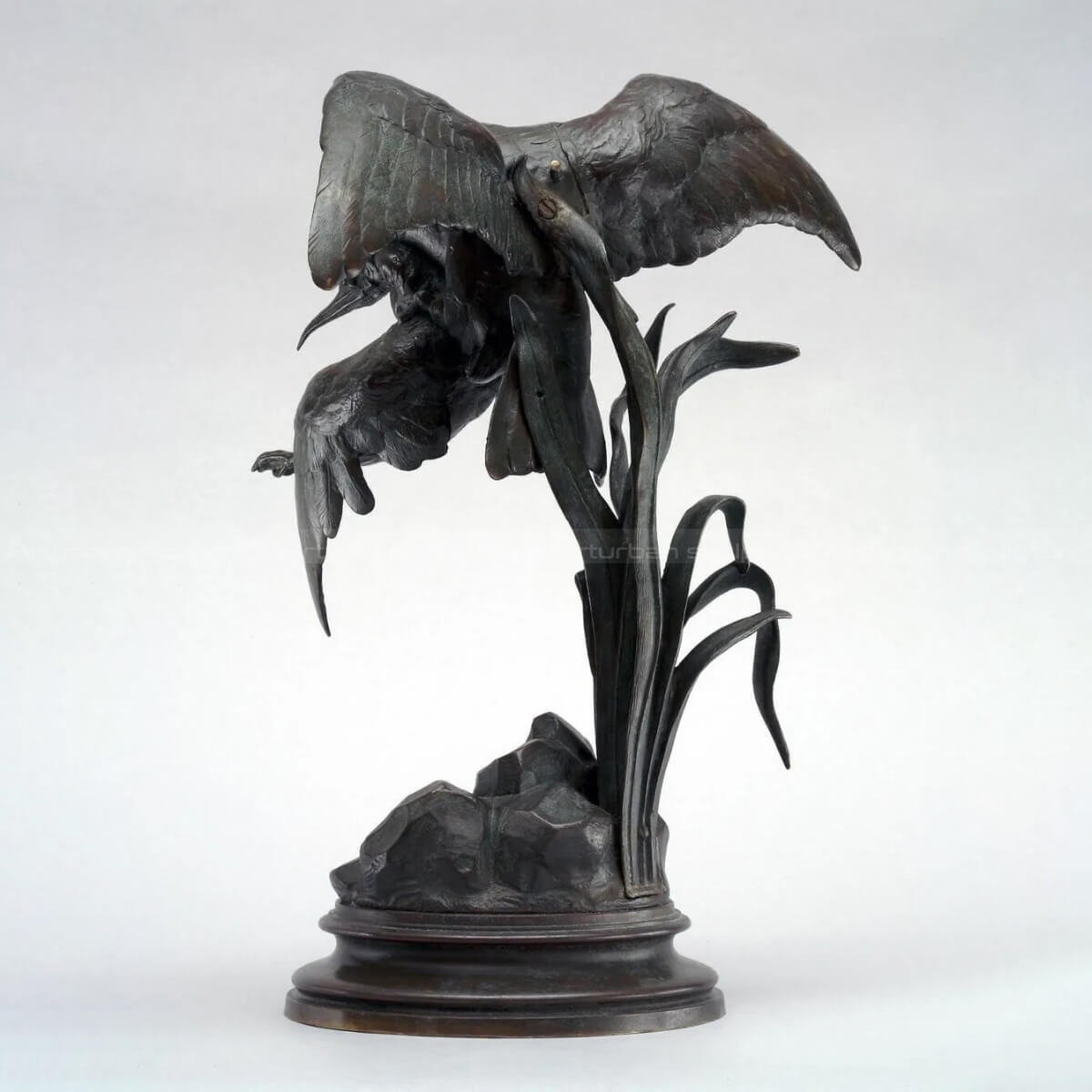 Milan bird of prey hunting heron statue