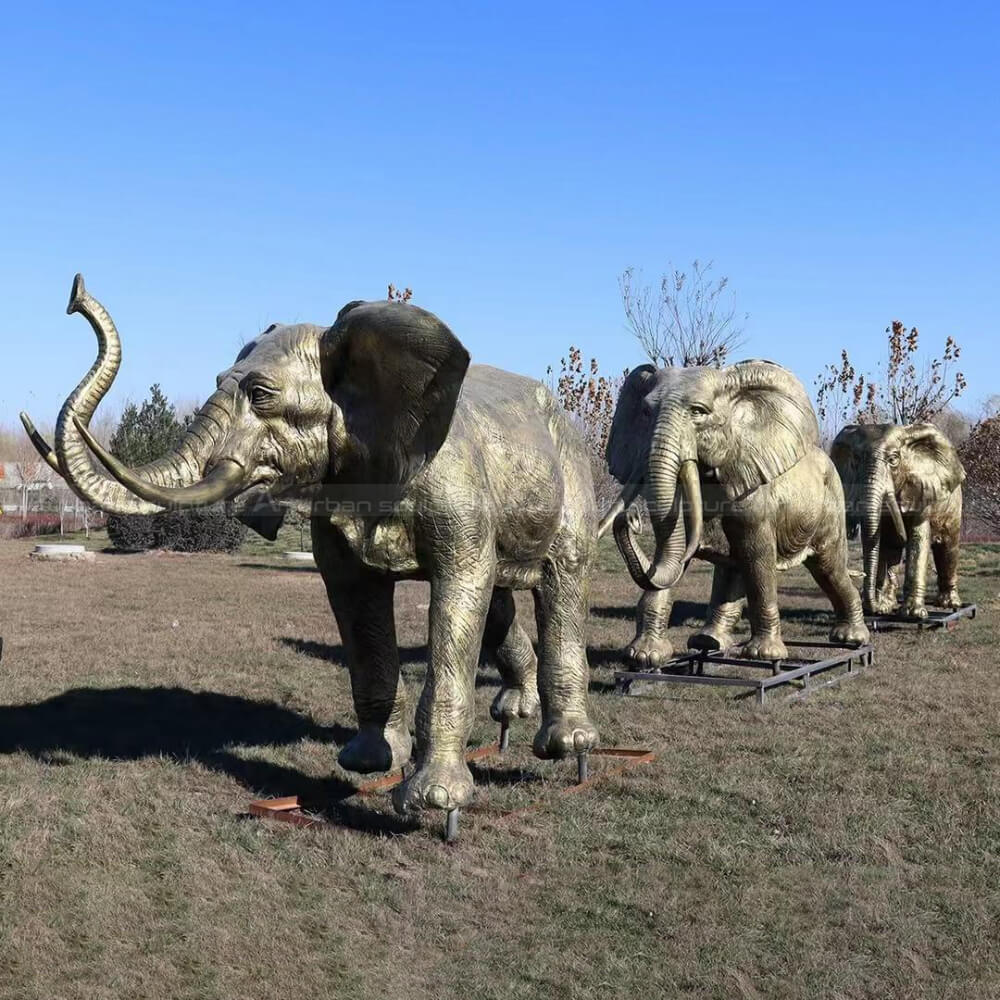 Parade of Bronze Elephants walking statue
