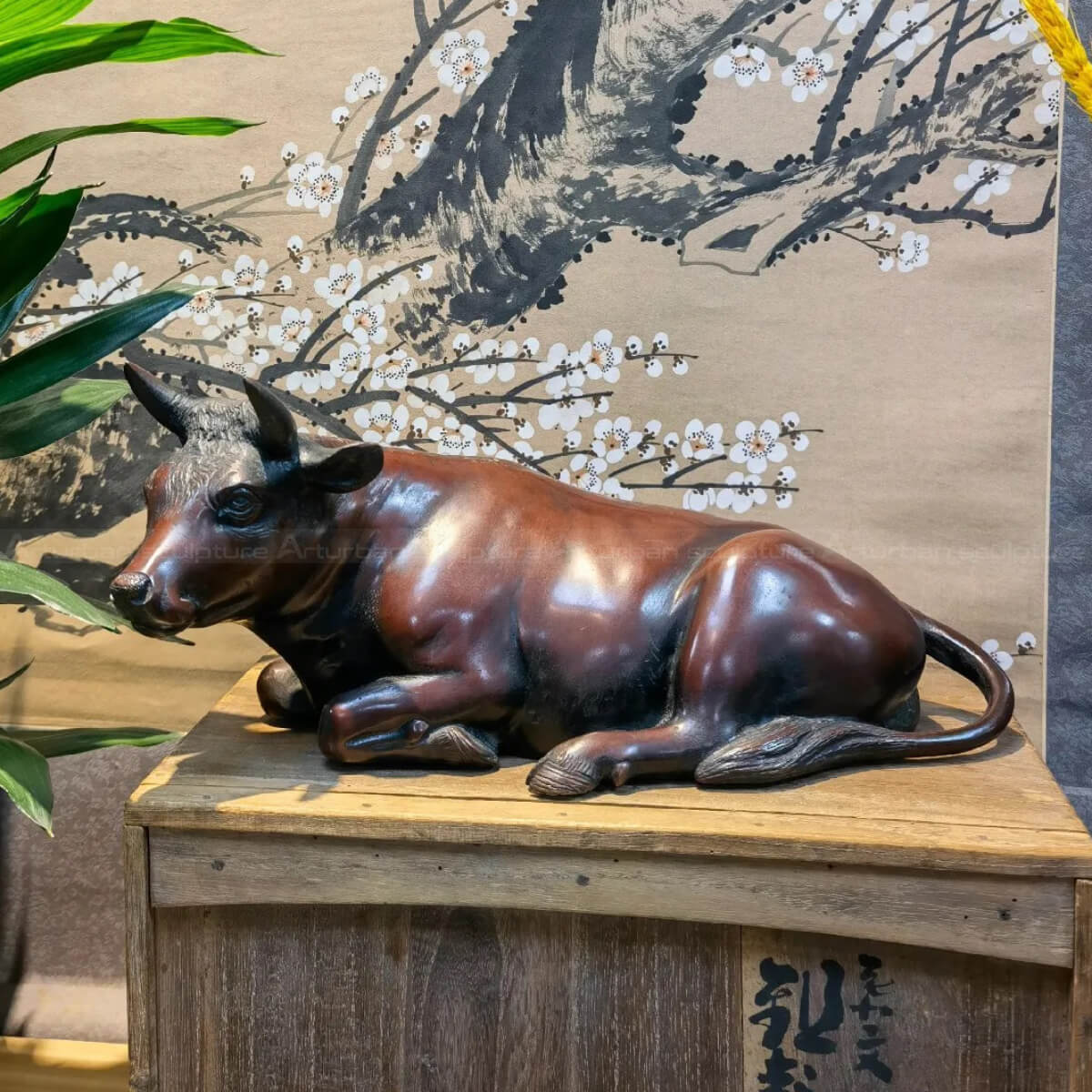 cattle lying down bronze statue