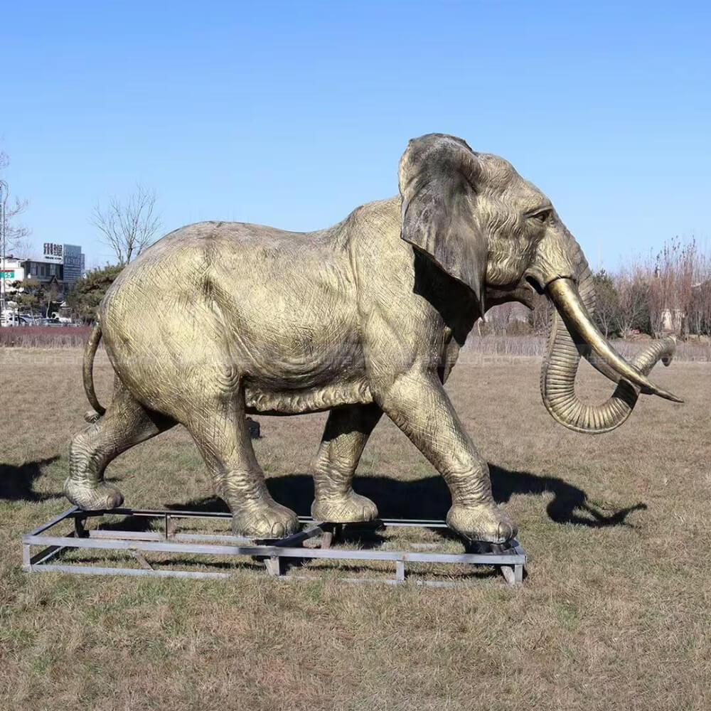 elephant walking bronze sculpture