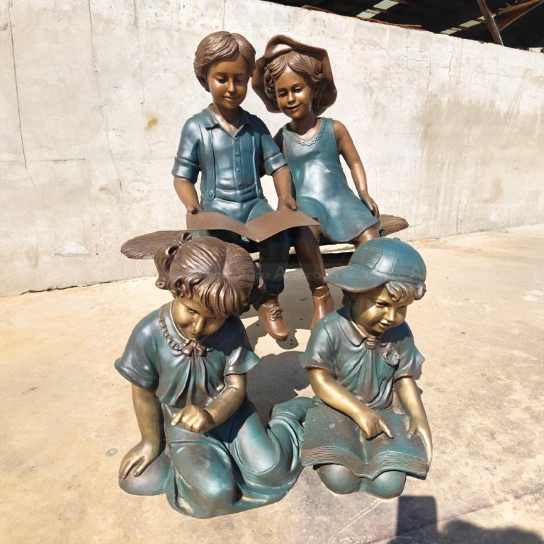 four Children Reading and interacting Statue