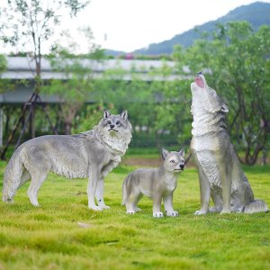 Grey Wolf Statue including an adult wolf howling, another standing, and a wolf pup