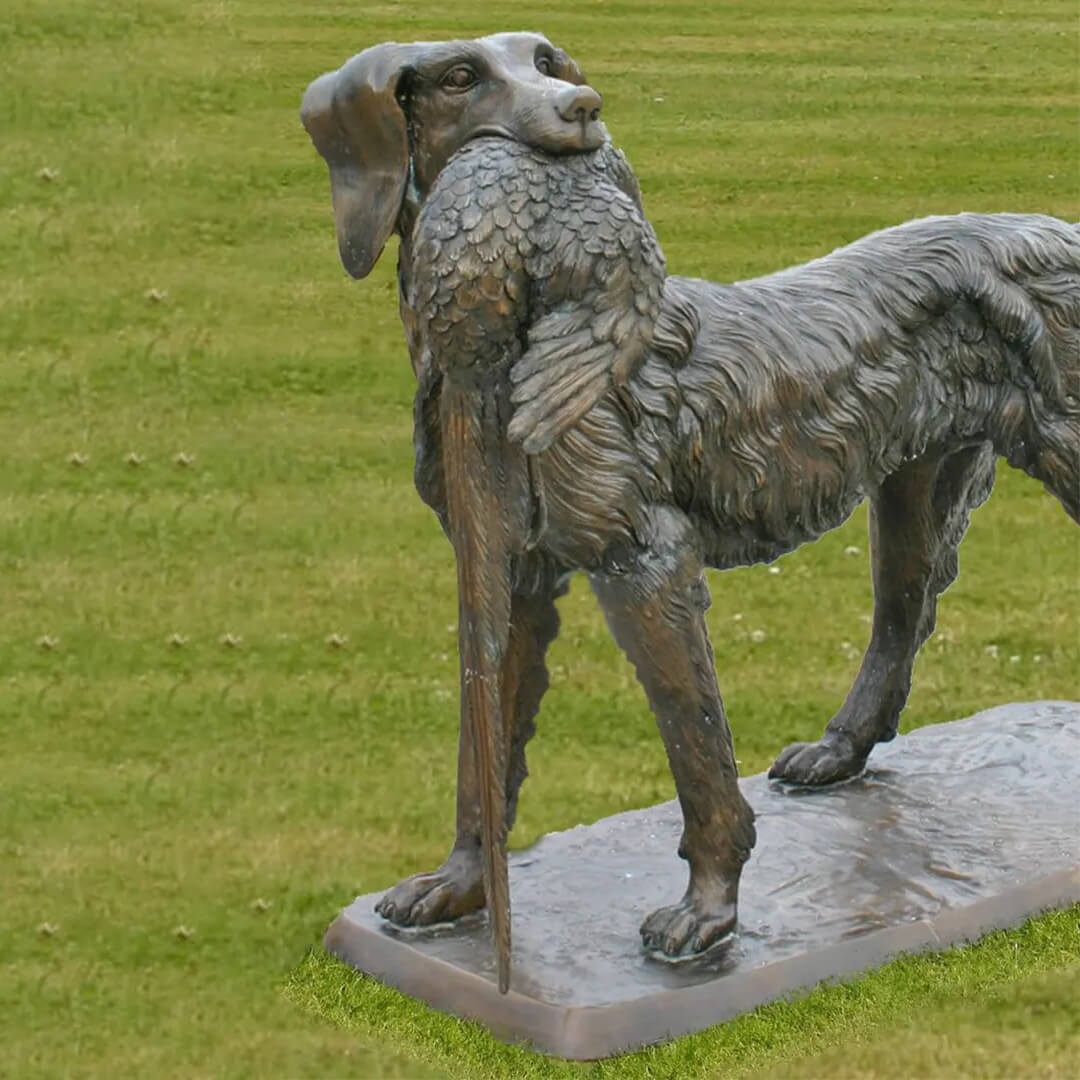 Labrador Retriever bronze Garden Statue holding a bird in its mouth