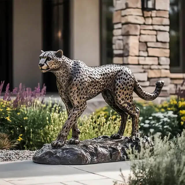 bronze Cheetah yard Sculpture displaying a focused and alert expression