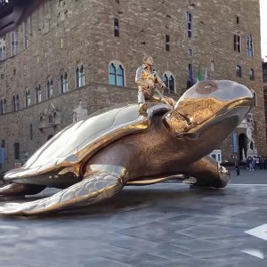 Sculpture de Tortue Géante en bronze avec un chevalier (autoportrait de Jan Fabre) assis sur son dos