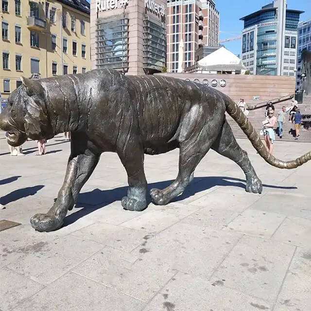 bronze Roaring Tiger Sculpture walking with a fierce expression