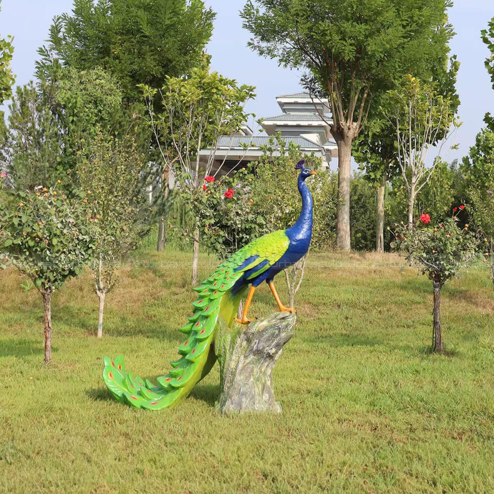 realistic fiberglass Peacock standing on stump sculpture