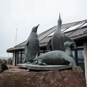 three Bronze Penguin Statues