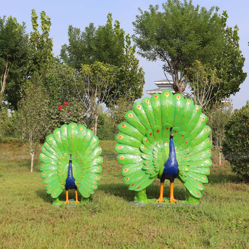 two Life Size Peacock Statue standing and spreading its tails