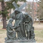 Bronze Way of the Cross Statue depicting Jesus holding Veronica’s veil as a Roman soldier stands beside him