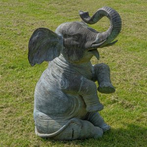 Sitting bronze Elephant Yard Statue on lawn