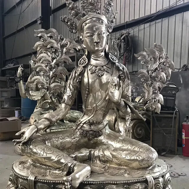 Green Tara Garden Statue in polished stainless steel, seated gracefully on lotus base