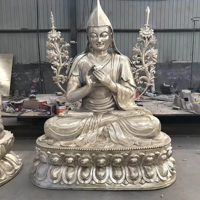 Je Tsongkhapa Statue in stainless steel depicting the founder of Gelugpa, seated on a lotus base