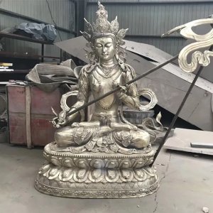 Statua di Buddha Manjushri in acciaio inossidabile seduto su una base di loto
