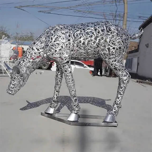 Stainless steel Metal Deer Garden Ornaments featuring a grazing deer with intricate hollow patterns