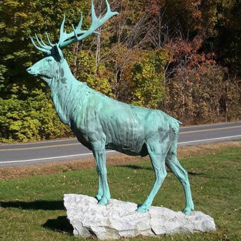 A Life Size Elk Statue in bronze, featuring a majestic bull elk with large antlers standing on a stone base