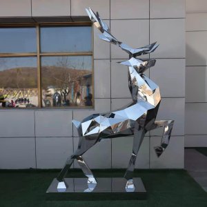A Modern Deer Sculpture made of stainless steel with geometric faceted design