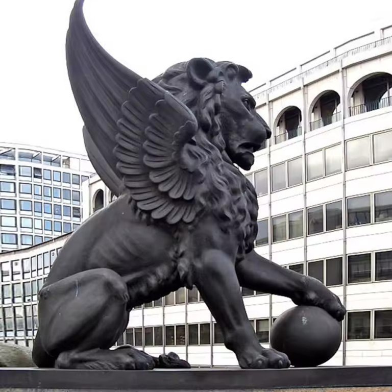 Bronze Large Lion Statue with Wings, realistic mythical creature with powerful lion form, spread wings and paw resting on sphere