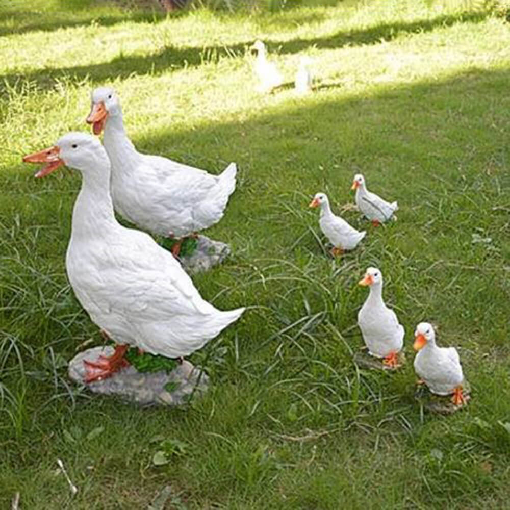 Decorative fiberglass Duck Family Lawn Ornaments featuring lifelike details of ducks on the lawn