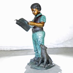 Bronze Boy Reading Statue with attentive dog
