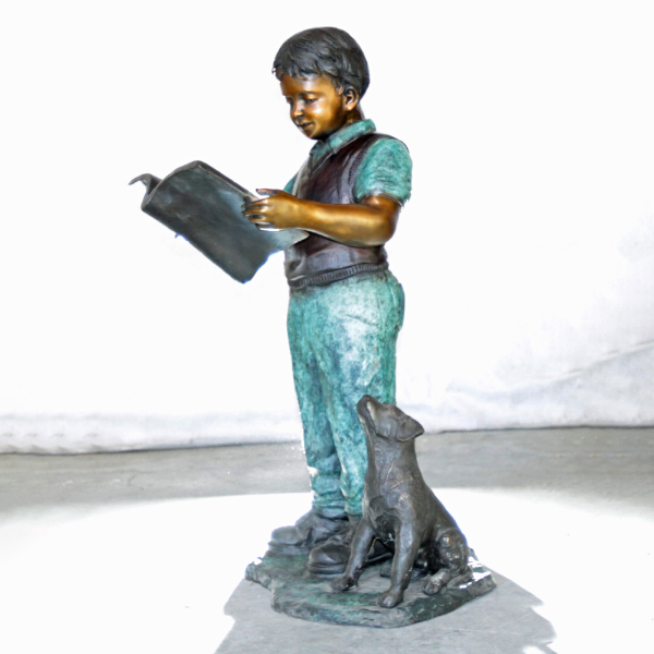 Bronze Boy Reading Statue with attentive dog