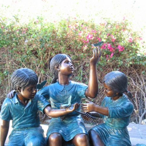Bronze Children with Butterfly Statue close detail