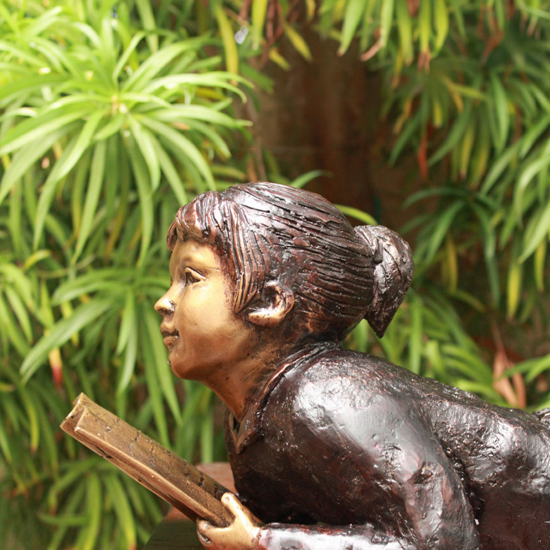Bronze Girl Reading Book Garden Statue closeup