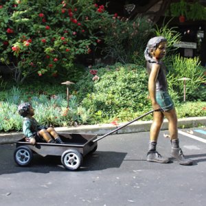 Brother and Sister Sculpture bronze wagon scene