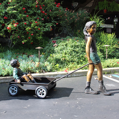 Brother and Sister Sculpture bronze wagon scene