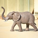 3 Bronze elephant with trunk up statue side view