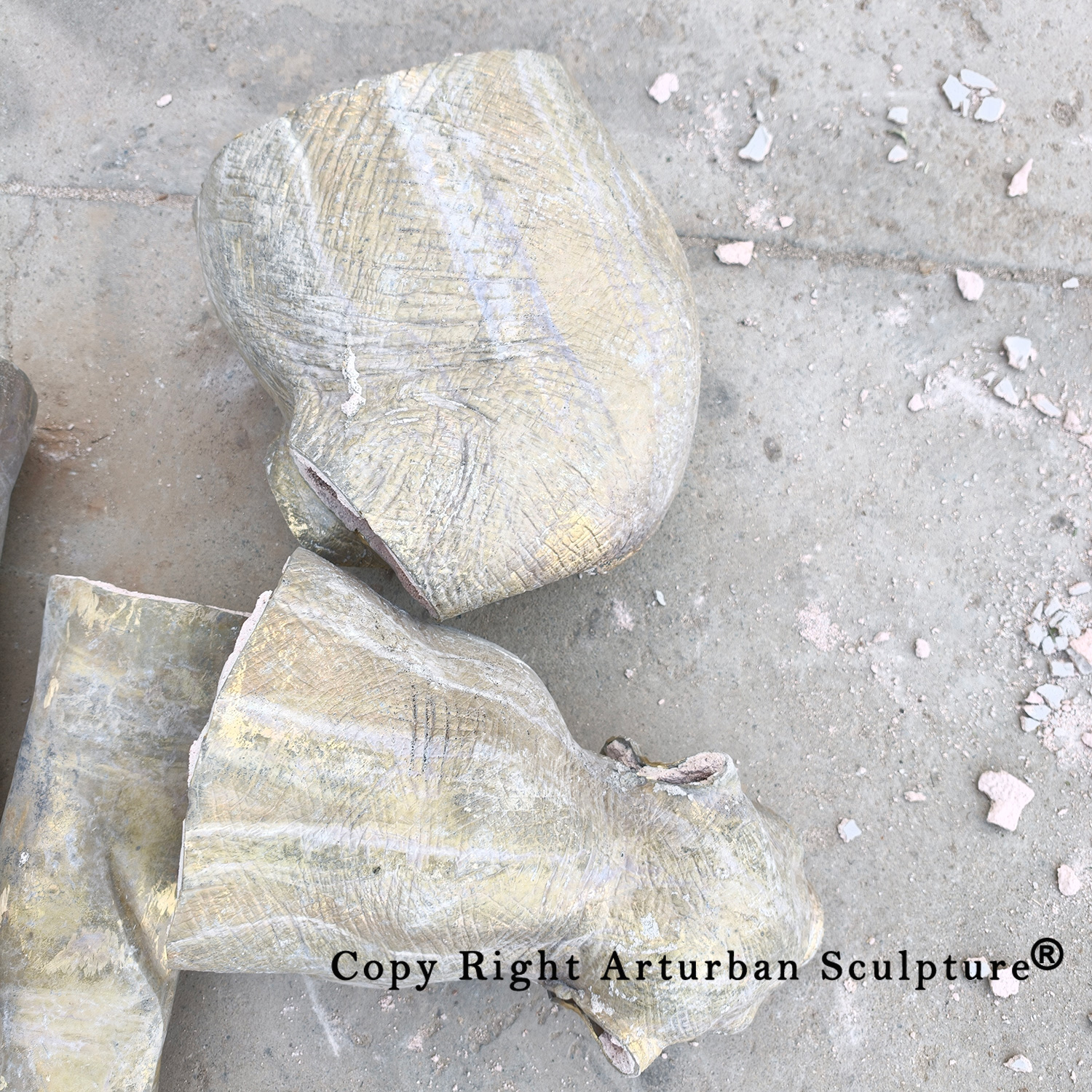 5 Bronze elephant castings after shell removal